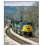 A S/B mixed snakes its way past the entrance to Wauhatchie yard.